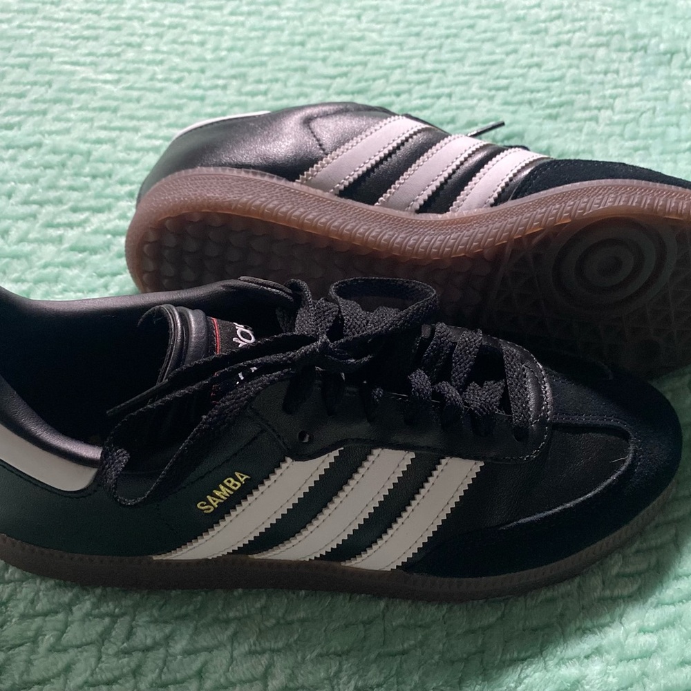 Adidas Black and White Sneakers with Iconic Stripes